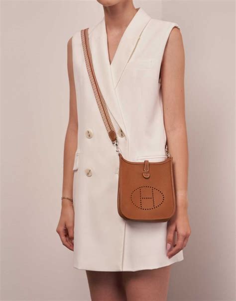 hermes taurillon clemence evelyne tpm gold|Hermes evelyne crossbody.